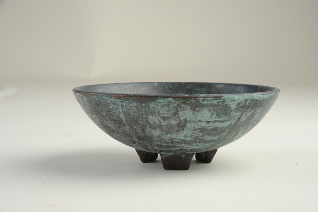Patinated bowl with tripod foot